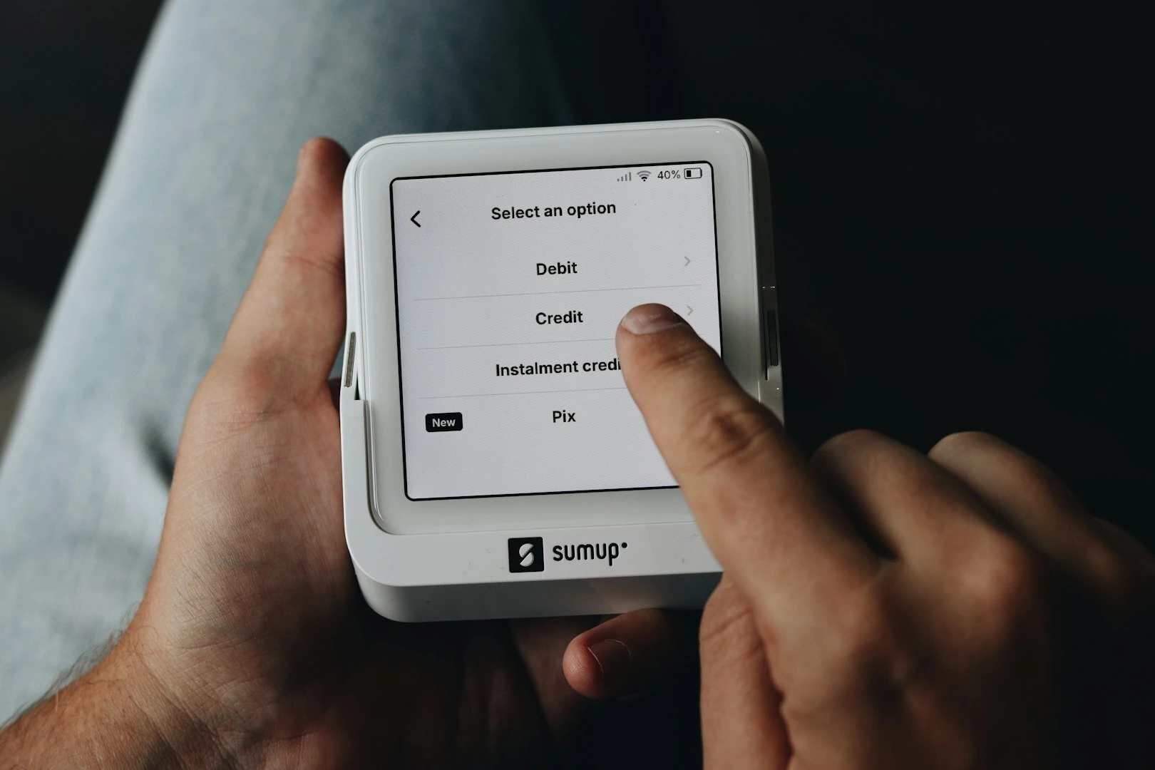 A-person-is-holding-a-tablet-in-their-hands